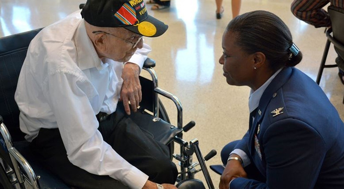 Veteran Officer with an Old Man