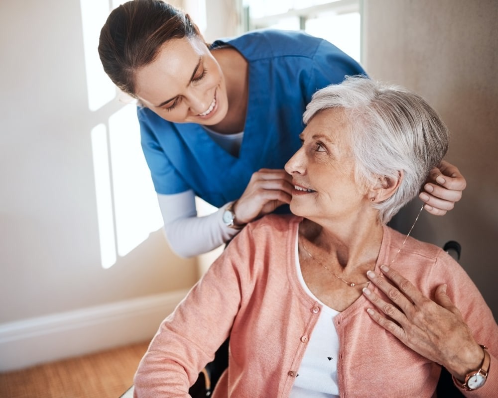 Caregiver with an Old Woman